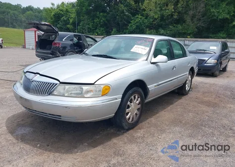 1999 Lincoln Continental z USA, uszkodzony, nr VIN 1LNHM97V7XY607937